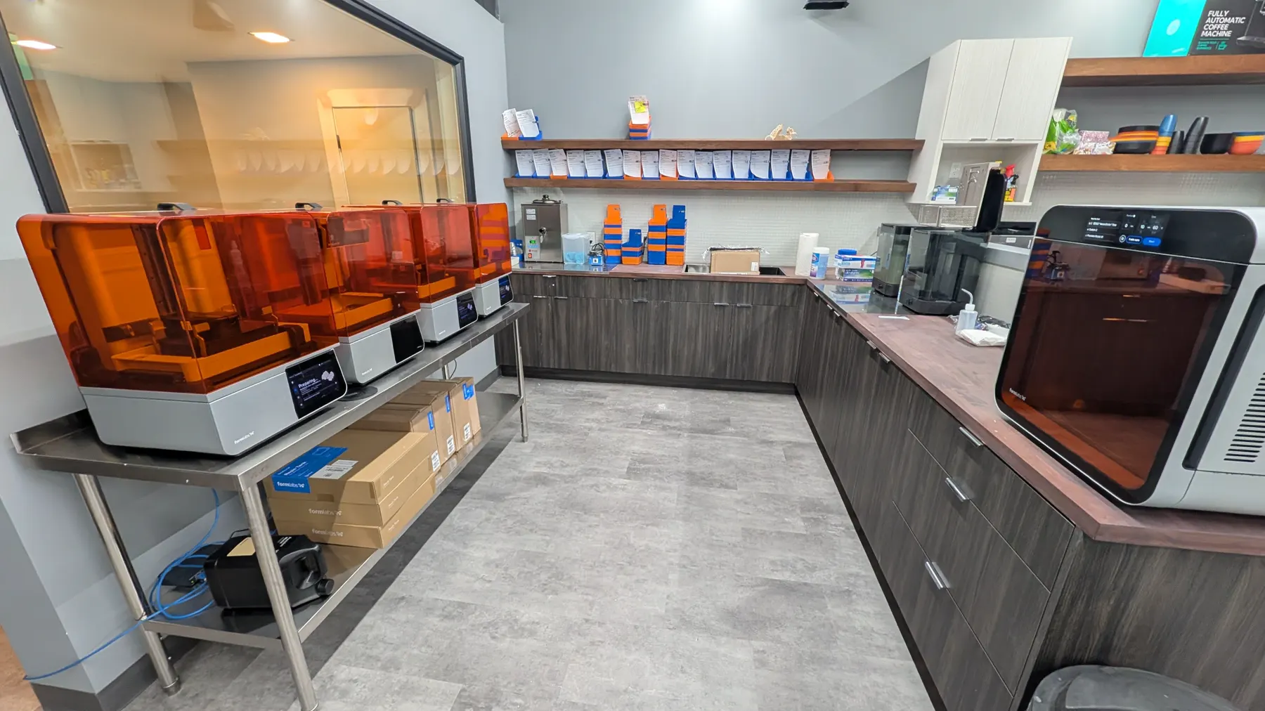 True North Kromes production lab with resin printers and organized workbench